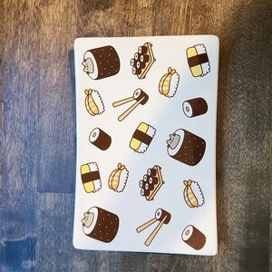 Pusheen the at sushi plate